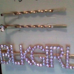 Three hair clips with jewels